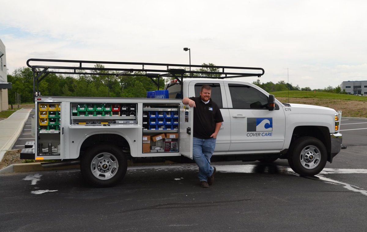 Cover Care, LLC technician with his truck