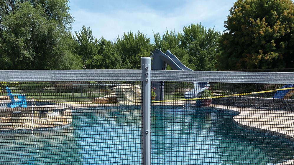 Gray pool fence