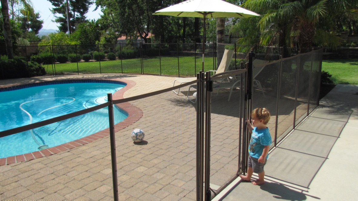 fence with child outside