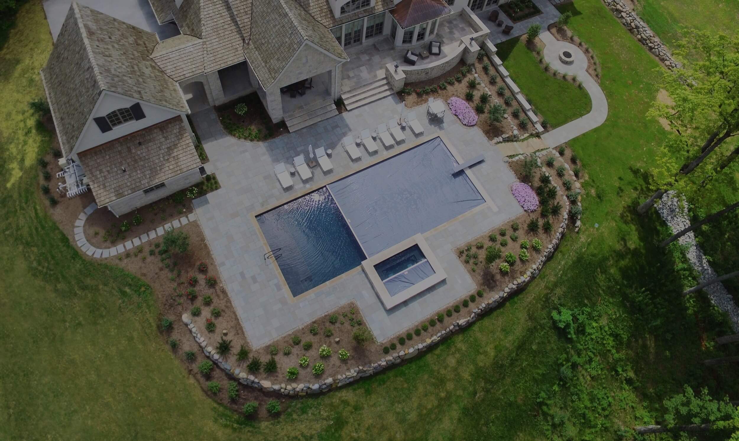 automatic pool cover pool and spa aerial view